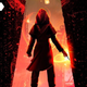 A figure stands facing a bright light in the cover illustration for Robert Jackson Bennett's Locklands.